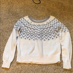 White sweater with jewels on it